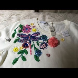 203). Incredible short sleeve sweater